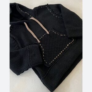 black hooded sweater with contrast stitching
NWOT